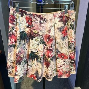 Haute Hiippie pleaded floral mini skirt